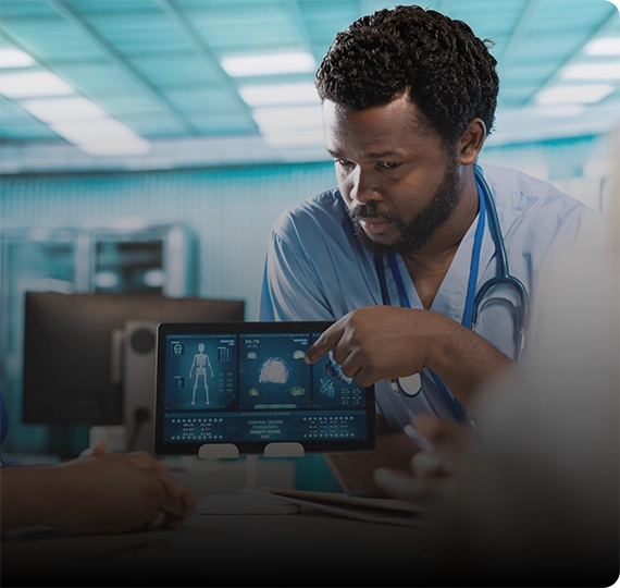 Physician examining scans